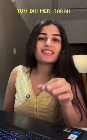 Yashika's reel, filmed at her desk, captioned 'Tum bhi meri tarah'